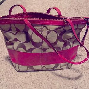 Coach bag. Signature print with hot pink detail